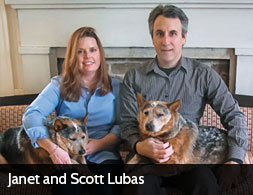 Photo of Janet and Scott Lubas with their dogs.